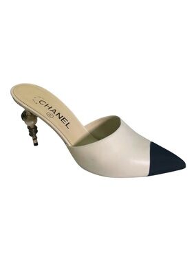 CHANEL Women's Cream and Black Mules with Pearl Accent